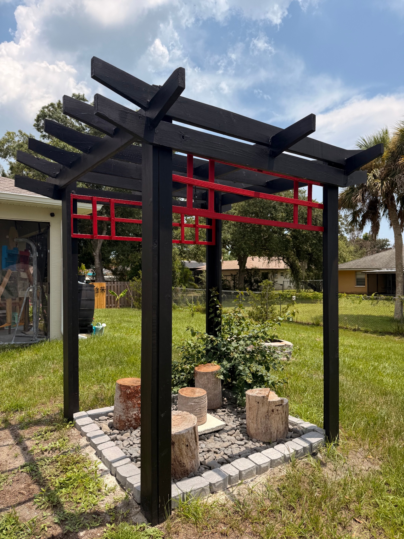 Black and red garden torii pergola