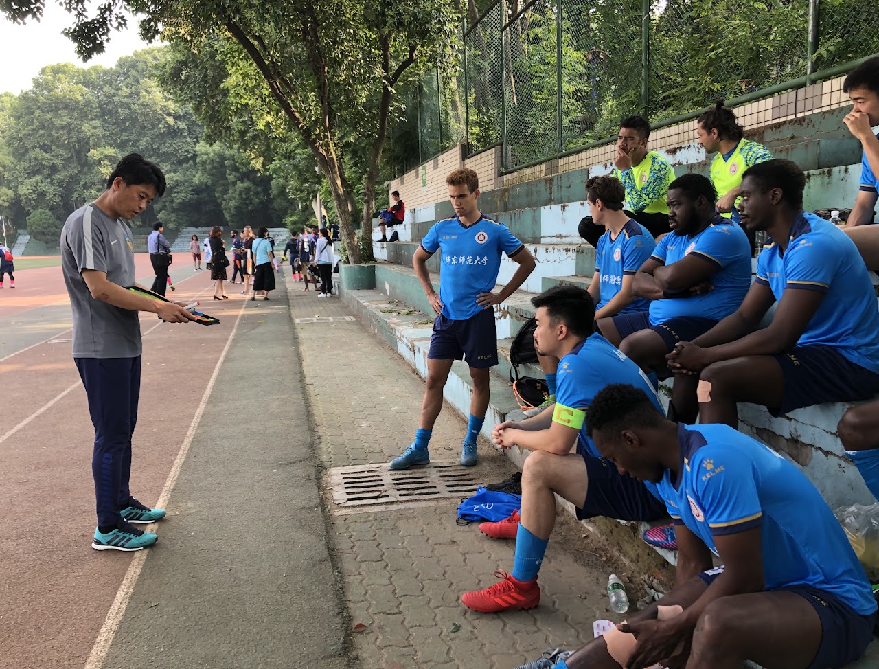 Receiving instructions from coach in Mandarin